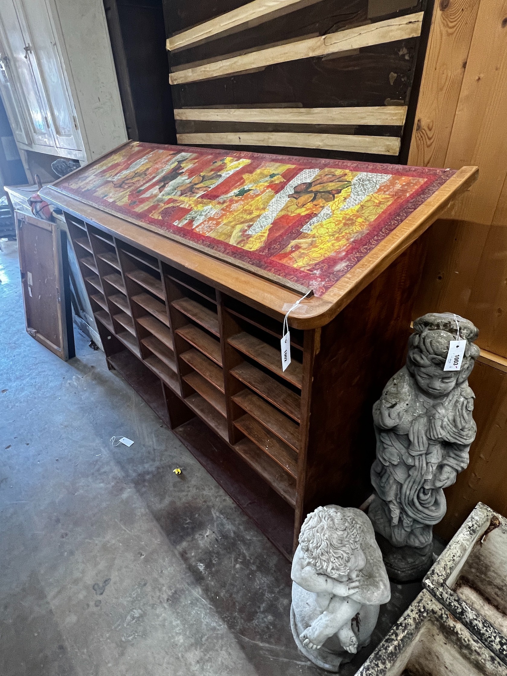 An early 20th French beech postroom pigeonhole cabinet, width 179cm depth 57cm height 130cm
